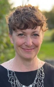 A picture of Liska McNally smiling outside.